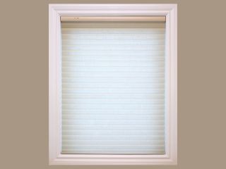 Cordless Blinds and Shades | Malibu Blinds & Shades CA Cordless Roman Shade in a Sunlit Room