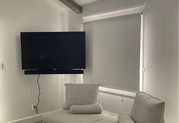 Modern living room adorned with blackout roller shades